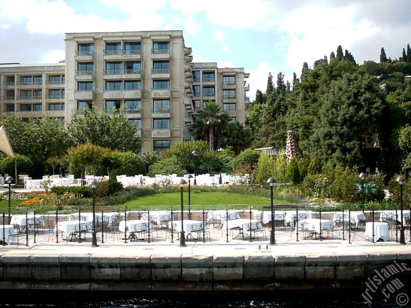 View of the Ciragan Palace`s gargen from the Bosphorus in Istanbul city of Turkey.
